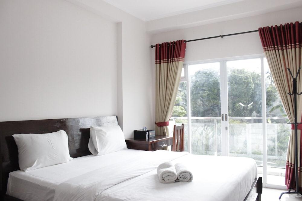 Simply Homey Studio at Gateway Pasteur Apartment near Exit Toll Featured Image